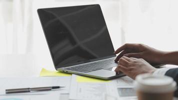 Financial analysts analyze business financial reports on a digital tablet planning investment project during a discussion at a meeting of corporate showing the results of their successful teamwork. video