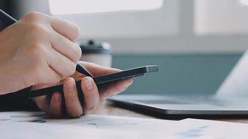 Financial analysts analyze business financial reports on a digital tablet planning investment project during a discussion at a meeting of corporate showing the results of their successful teamwork. video