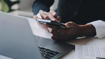 Financial analysts analyze business financial reports on a digital tablet planning investment project during a discussion at a meeting of corporate showing the results of their successful teamwork. video