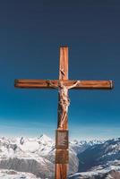 Panoramic view of the Swiss Alps mountains from the terrace of the Matterhorn glacier paradise, Switzerland. The Cross at Matterhorn glacier paradise - Klein Matterhorn. photo