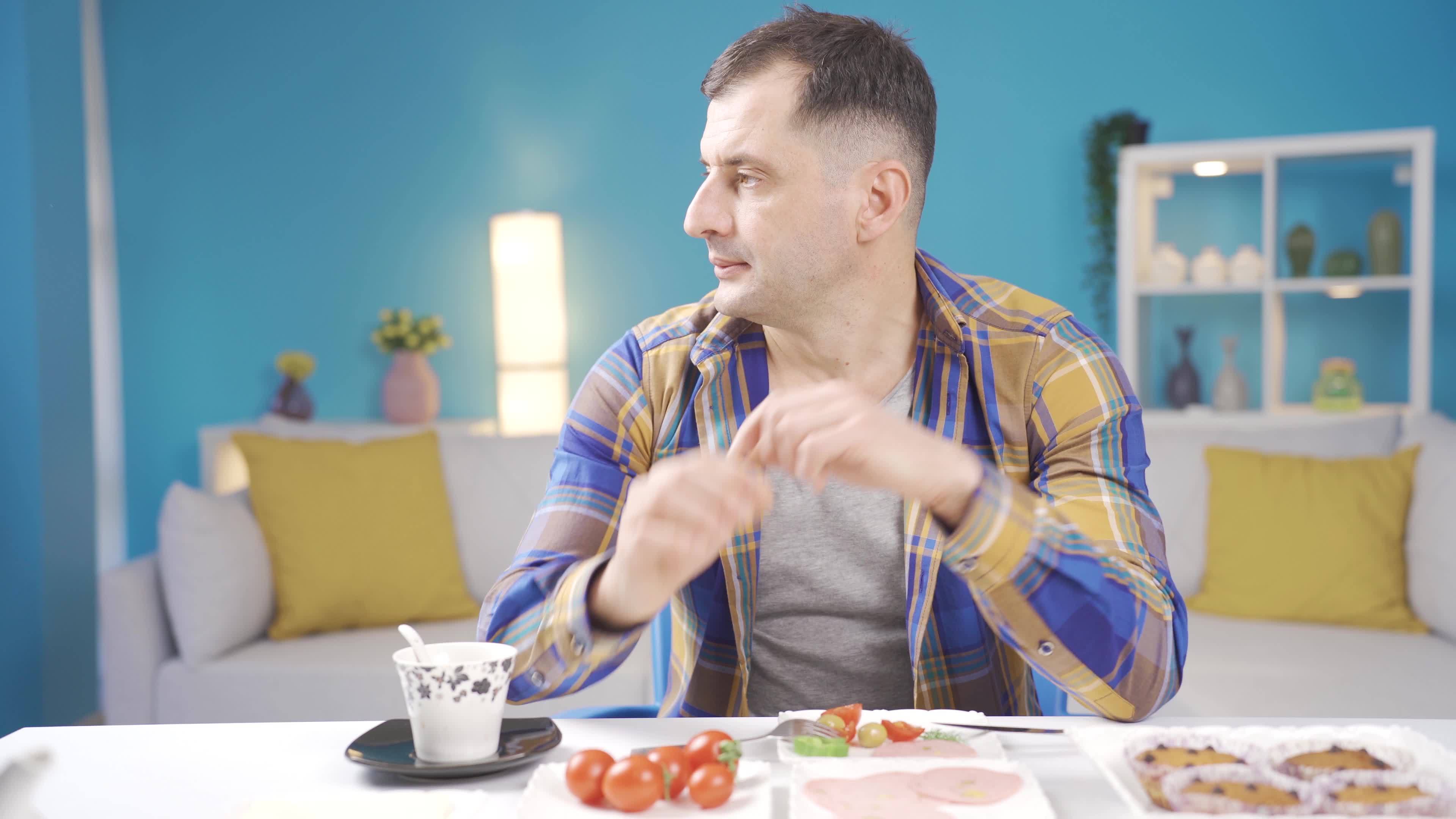 Single man living alone is sad and thinking about unhappiness. Man