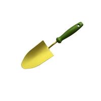 Little metal trowel cut out object, garden appliances isolated, clipping path photo