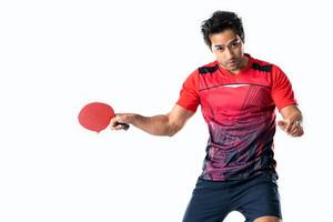 Portrait of sports man male athlete playing table tennis isolated. photo