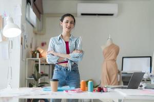 Female entrepreneurs are making new clothing collections. photo