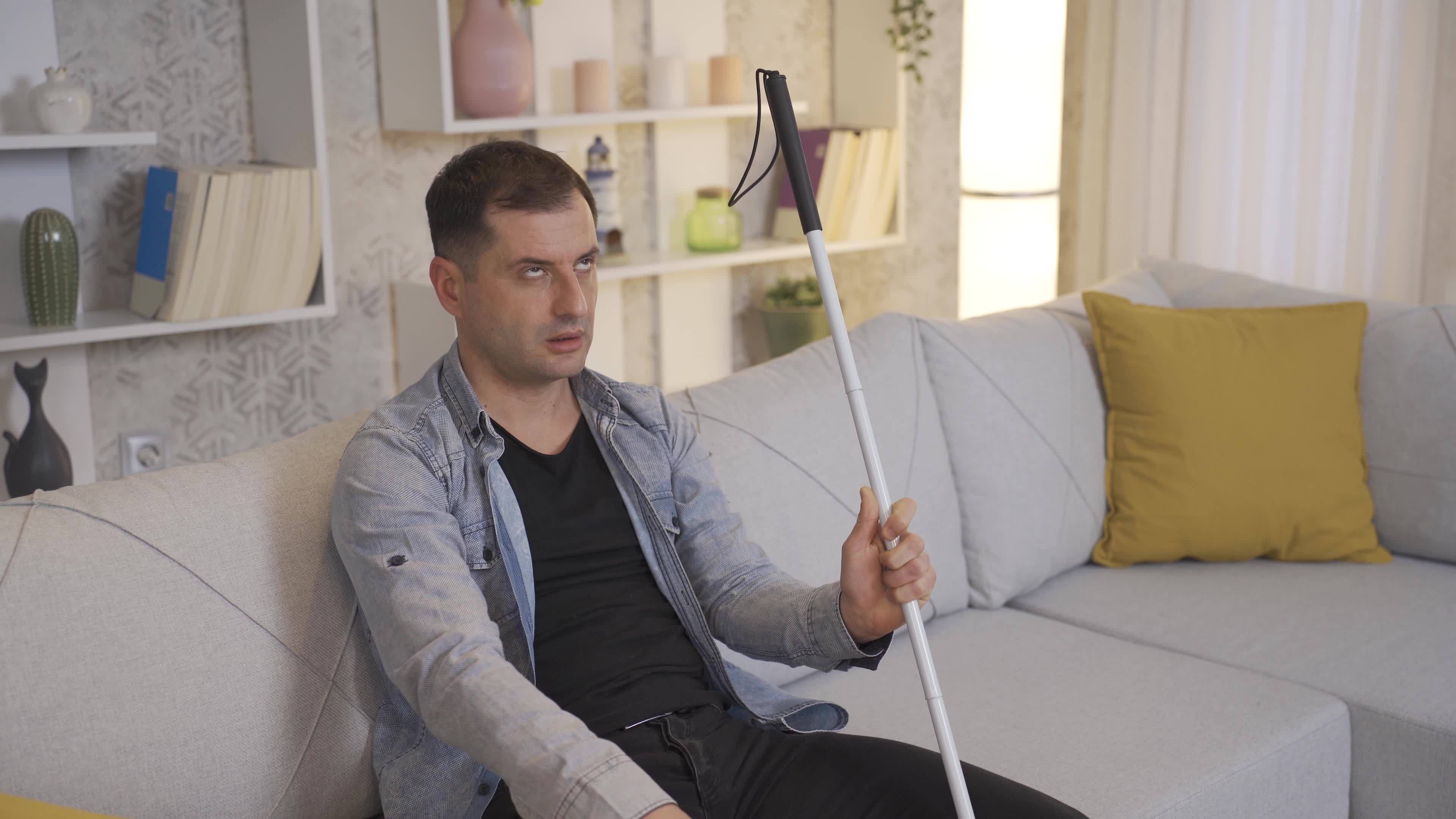 Blind man tired of living alone. Unhappy and tense expression. Sad and