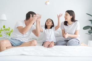 Lovely parents and daughter happy smiling faces. photo