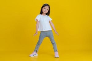 Girls doing various poses in the studio. photo