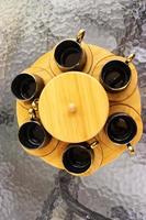 Empty Tea set on the marble table in wooden tray,black and brown color photo