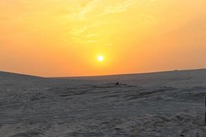 A beautiful view of sunrise on beach photo