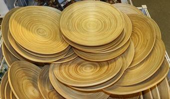 Bamboo decorative plates,home decore accent,pile of bamboo plates in basket photo