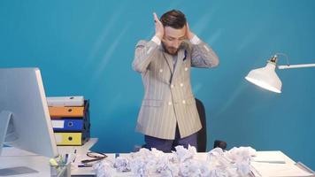 Frustrated businessman does not like the plans and actions and crumples the papers. Frustrated businessman does not like the plans and actions and crumples the papers. video