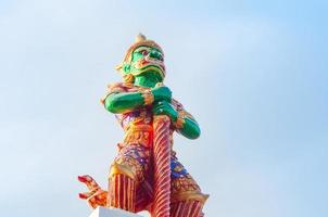 Giant statue  Wat Phra That Doi Kham at Chiang Mai,Thai temple Northern Thailand. photo