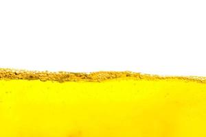 Beautiful wave of air bubble inside isolated on white background,yellow summer drink with bubbles,Beer bubbles photo