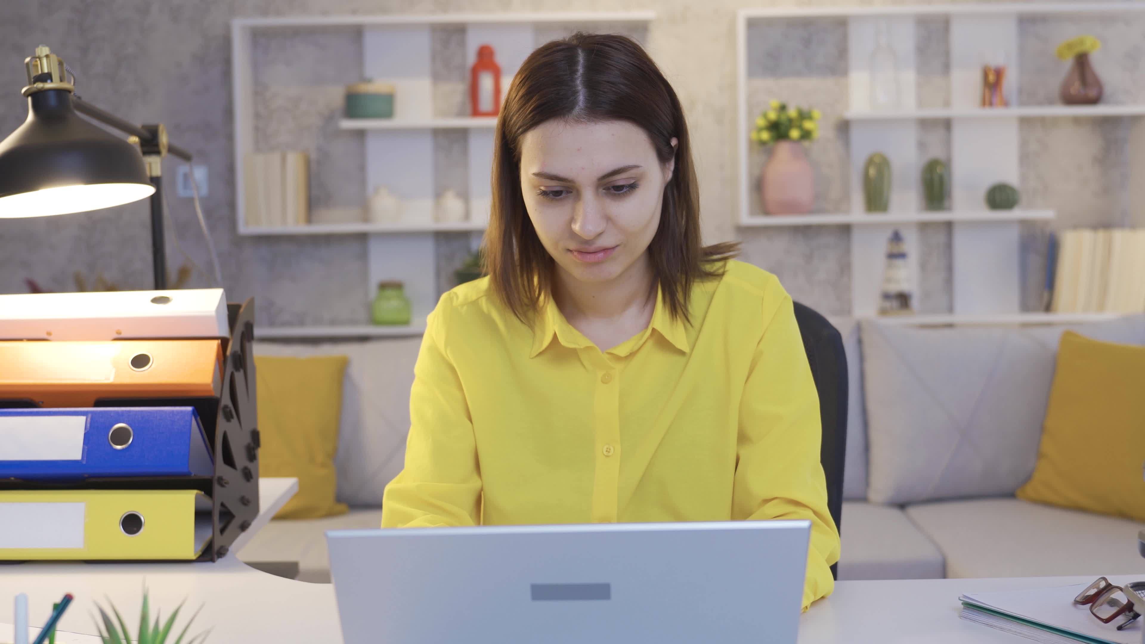 young-business-woman-happy-working-from-