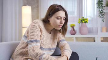 Gifted Girl Uses Laptop, Writes Notes for Study for Class Homework. Student Girl is learning, Studying for Exams, using laptop. Article, Composition, project assignment. video