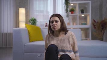The mentally ill young woman becomes paranoid, flees from the camera in fear and panic.  The camera shutters and scares the paranoid and schizophrenic woman. video