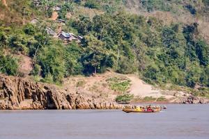 Boat along the river photo