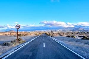 Road through the scenic landscape photo