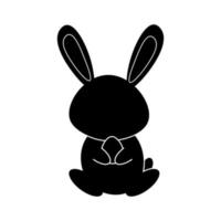 Glyph rabbit holding an egg in its paws vector