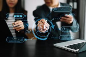 Man and woman using chatbot in computer and tablet  smart intelligence Ai.Chat GPT Chat with AI Artificial Intelligence, developed by OpenAI generate. Futuristic technology, robot in online system. photo