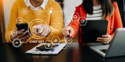 Man using chatbot in computer and tablet  smart intelligence Ai.Chat GPT Chat with AI Artificial Intelligence, developed by OpenAI generate. Futuristic technology, robot in online system. photo