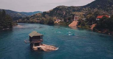 House on a rock on the Drina River in Serbia video