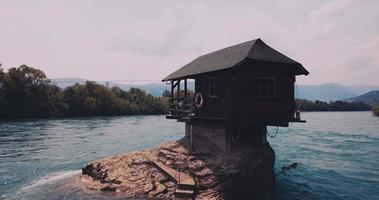 House on a rock on the Drina River in Serbia video