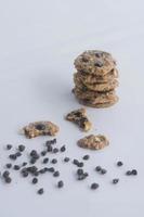 a chocolate cookies with chocolate chips, isolated on white background photo