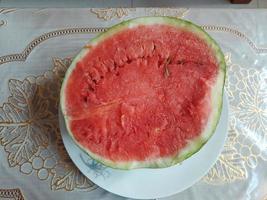 One Slice Pieces Watermelon in a Plate photo