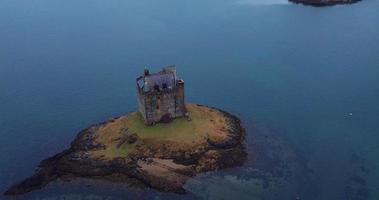 Aerial view of Castle Stalker in Scotland video
