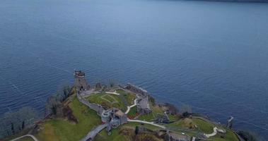 Aerial view of Urquhart Castle on Loch Ness in Scotland video