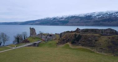 Aerial view of Urquhart Castle on Loch Ness in Scotland video