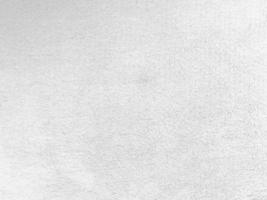 White clean wool texture background. light natural sheep wool. white seamless cotton. texture of fluffy fur for designers. close-up fragment white wool carpet. photo