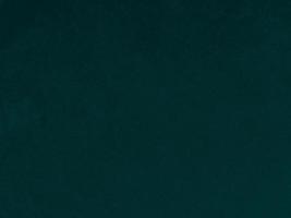 Dark green old velvet fabric texture used as background. Empty green fabric background of soft and smooth textile material. There is space for text. photo
