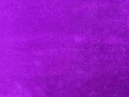 Purple velvet fabric texture used as background. Empty purple fabric background of soft and smooth textile material. There is space for text. photo