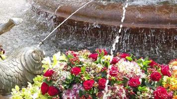 beautiful fountain decorated with flowers video