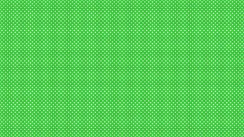 white color polka dots over lime green background vector