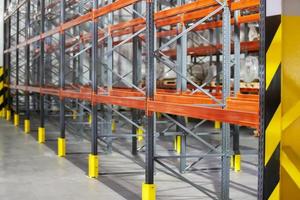 Metal structure of warehouse shelves for storing products. photo