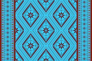 Ethnic folk geometric seamless pattern in cyan and red tone in vector illustration design for fabric, mat, carpet, scarf, wrapping paper, tile and more