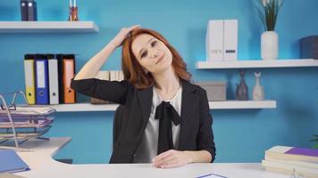 Exercises that can be done in the office. neck exercises. Business woman doing neck exercises in the office. video