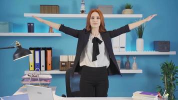 Exercises that can be done in the office. Shoulder and back exercises. Business woman doing standing shoulder and back exercises in office. video