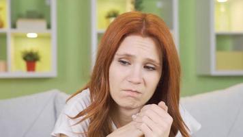 Desperate thoughtful woman alone and sad at home. Lonely young woman thinks at home, worries about her grief and unhappiness, receives bitter news, falls ill. video