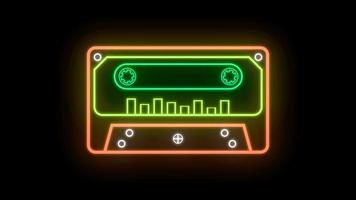 A retro neon tape loop animation displays a color gradient on a black background video