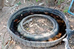 Water in the tray in forest, which is a breeding ground for mosquitoes and spreads disease. photo