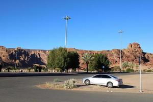 Al Ula, Saudi Arabia, March 2023 - Tourists are in their cars to visit historical sites and archeology in Al Ula, Saudi Arabia. photo