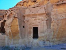 Beautiful daytime view of Al Hegra, Madain Saleh archaeological site in Al Ula, Saudi Arabia. photo