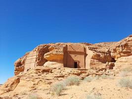 Beautiful daytime view of Al Hegra, Madain Saleh archaeological site in Al Ula, Saudi Arabia. photo