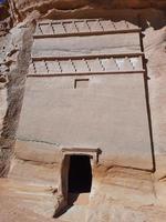 Beautiful daytime view of Al Hegra, Madain Saleh archaeological site in Al Ula, Saudi Arabia. photo