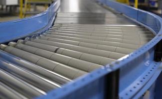 Conveyor belt inside a manufacturing site or distribution warehouse photo