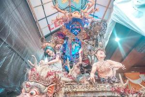 Ogoh-ogoh is a Balinese traditional giant puppet made of bamboo and paper mache, representing evil spirits. It's paraded around before the Nyepi Day to ward off negativity. photo